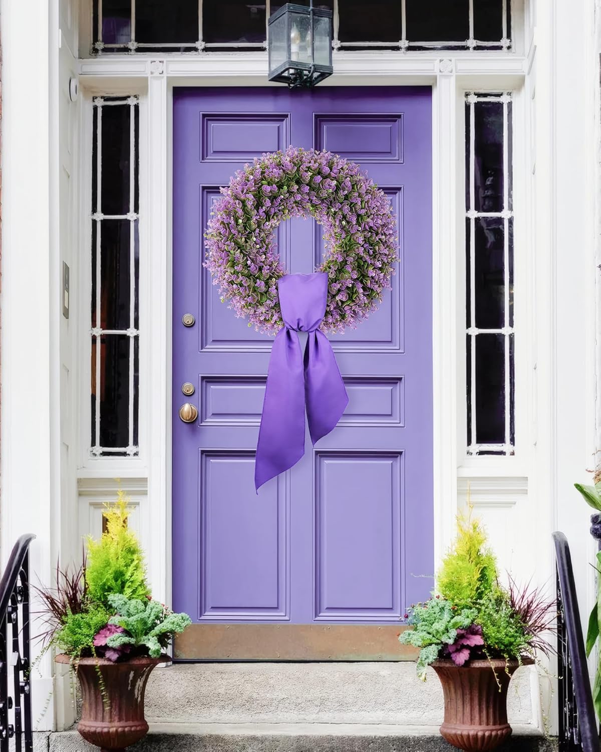 A 18 inch year round boxwood wreath is hanging on the front door.