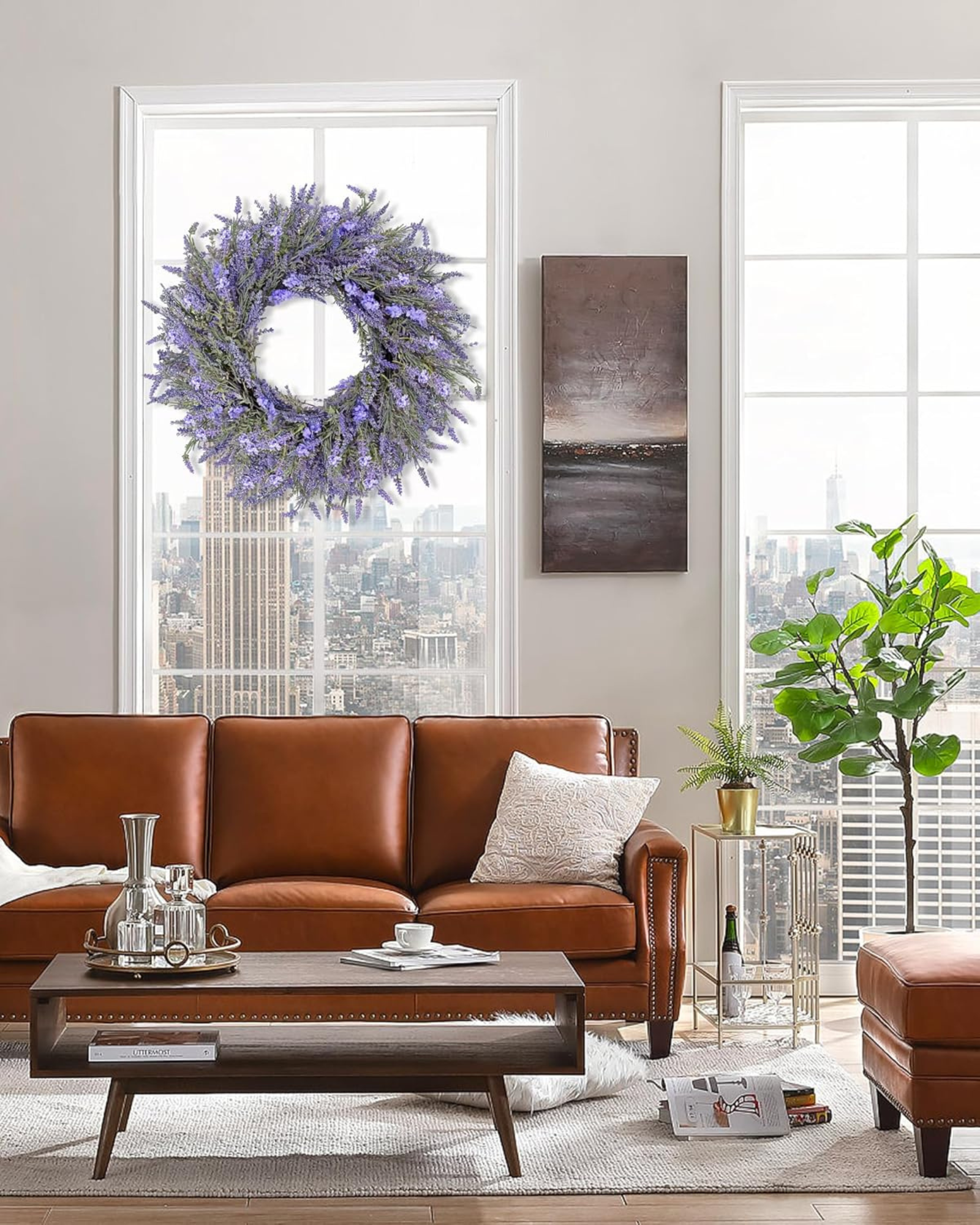 A 24 inch year round lavender wreath is hanging on the living room.