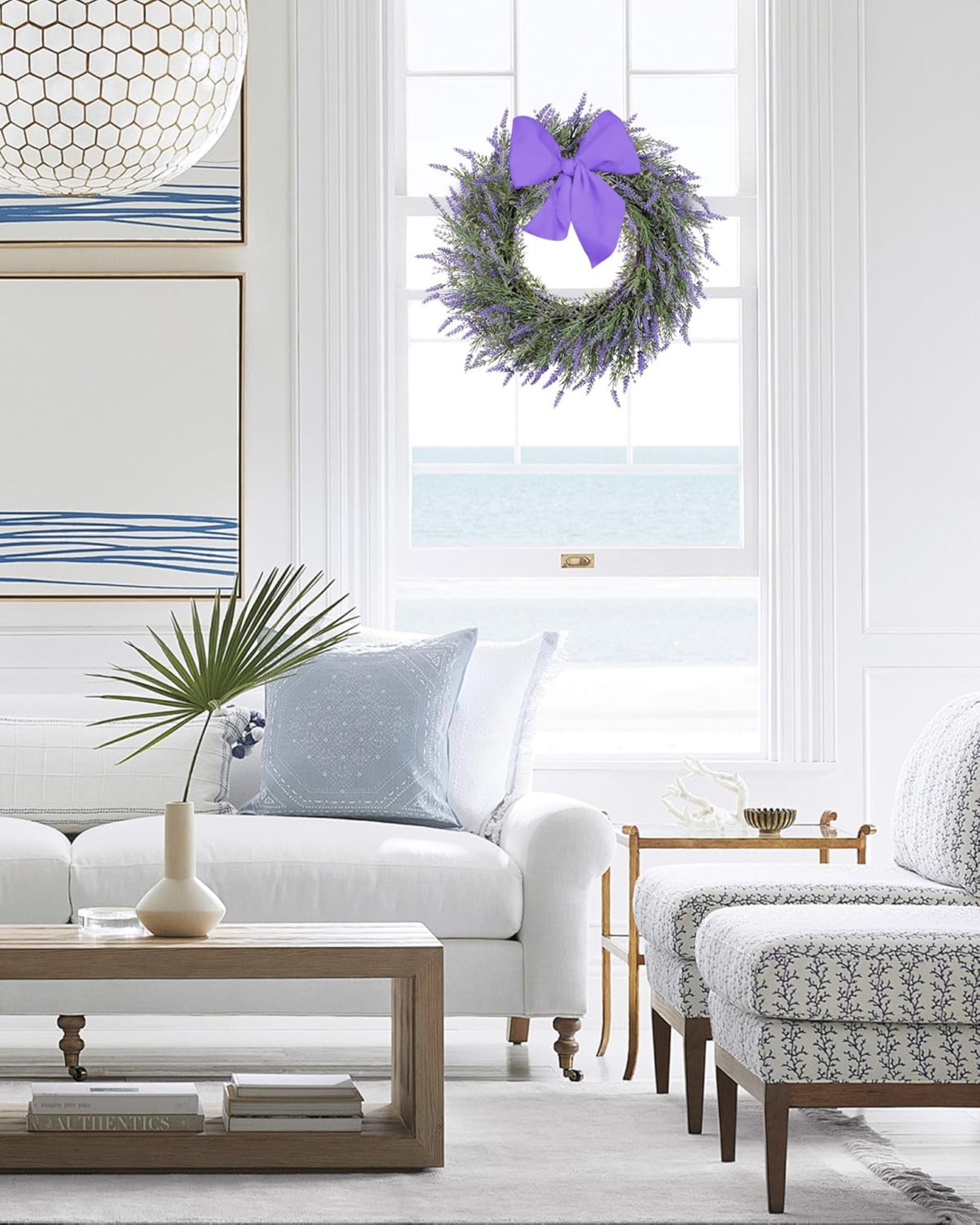 A 24 inch year round lavender wreath with dried-floral is hanging on the living room.
