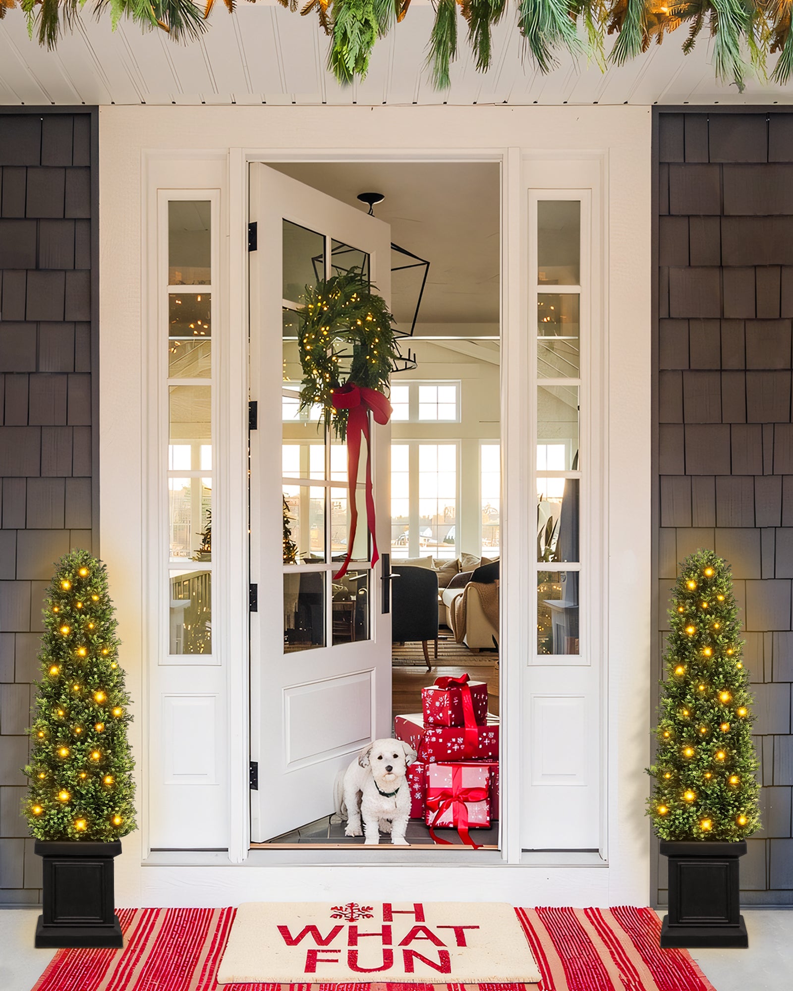 There're set of 2 4ft artificial topiary trees is setting in the front porch in christams.