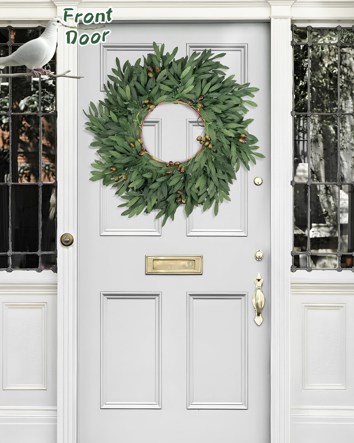 The 24 inch year round olive branch wreath is hanging on the front door.
